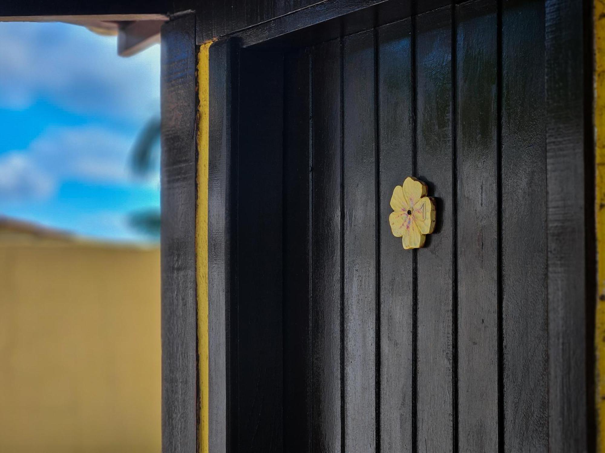 Bella Vista Ocean View Hotel Búzios Kültér fotó A golden flower-shaped knob on a door