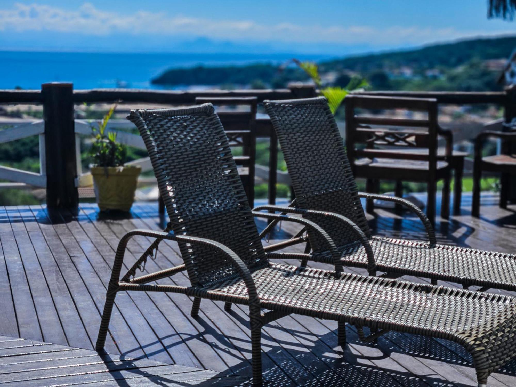 Bella Vista Ocean View Hotel Búzios Kültér fotó A view of the ocean from the deck of a home in the community