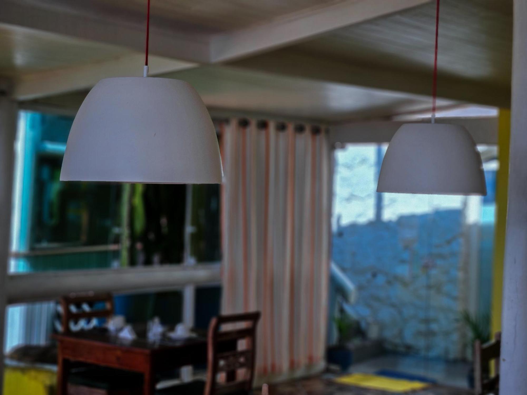 Bella Vista Ocean View Hotel Búzios Kültér fotó A pair of pendant lights
